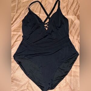 Sandy Beach black one-piece swimsuit featuring strap details at the waist